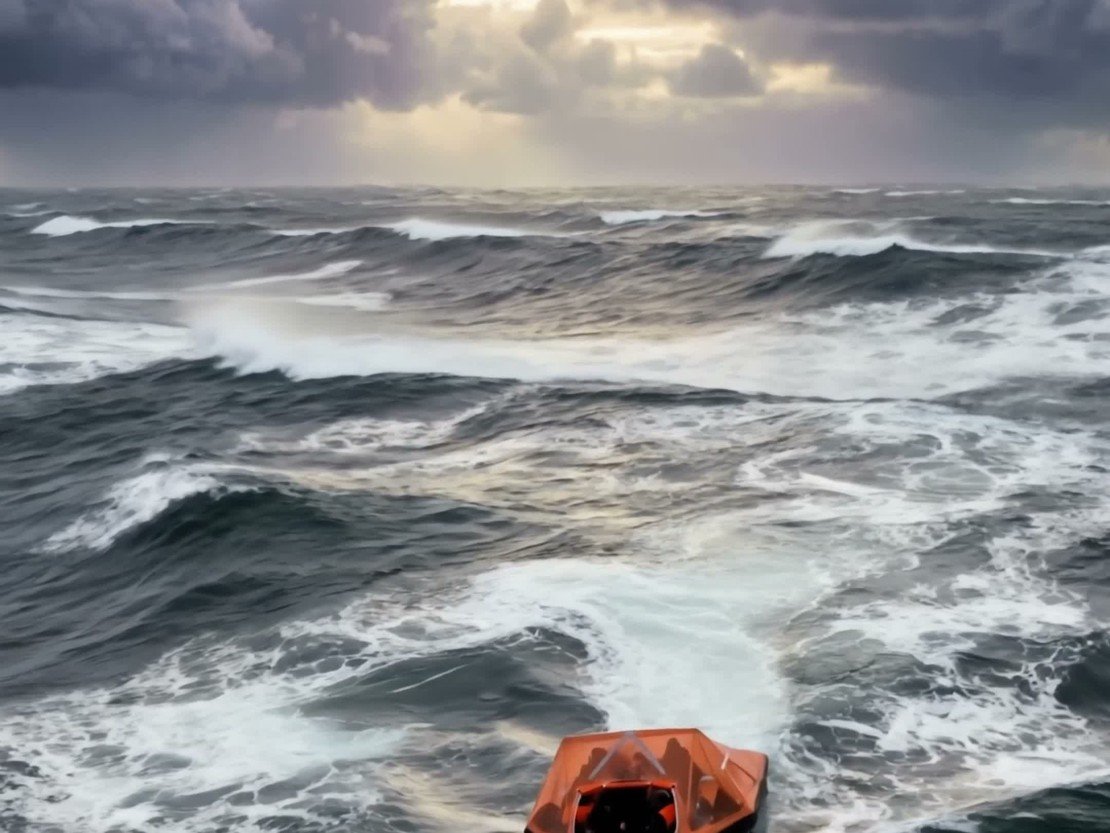 A small canopied orange life raft dwarfed by storm-tossed waves, under a dark sky with a single shaft of sunlight breaking through the clouds