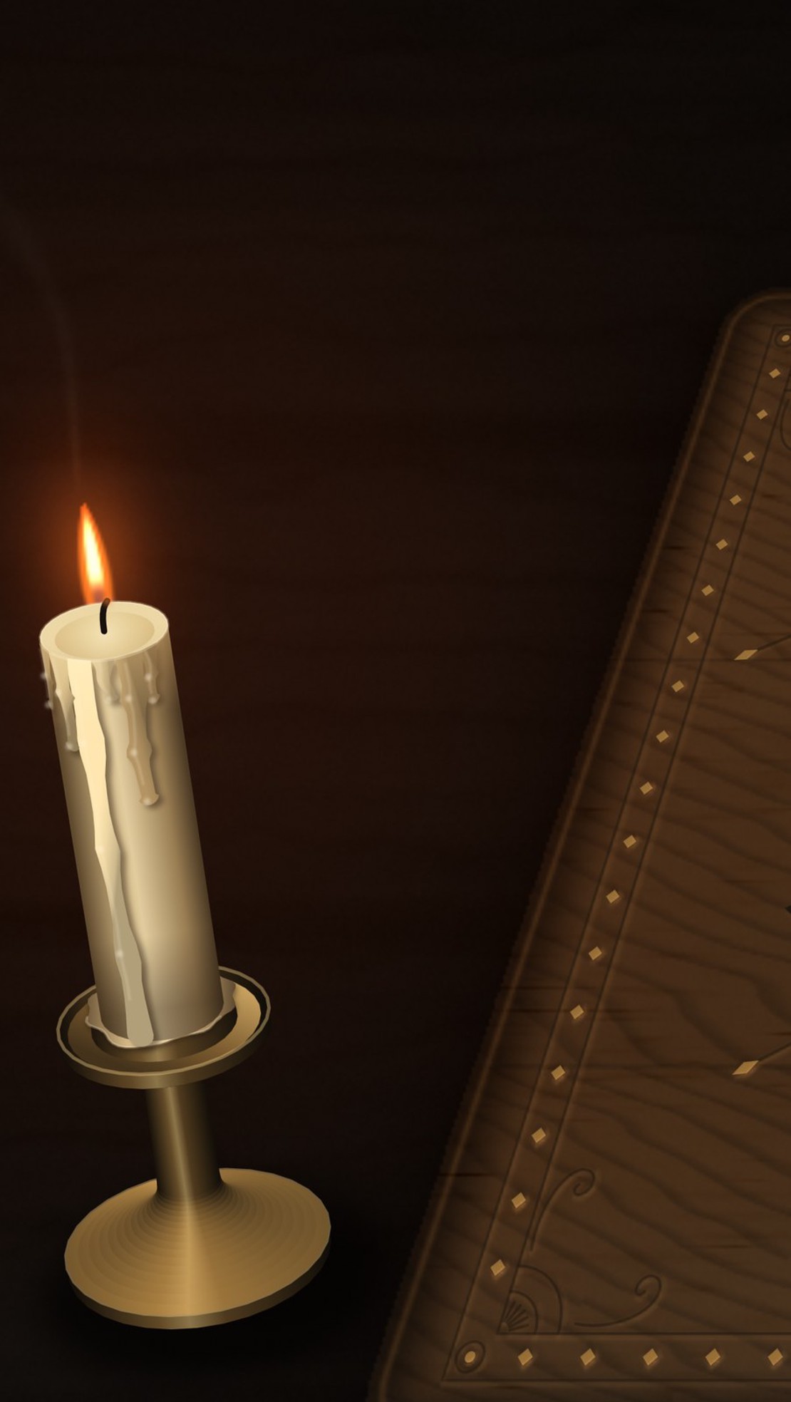 A tall ivory candle in a brass holder at the corner of the board, wax run down its side and pooled in the socket