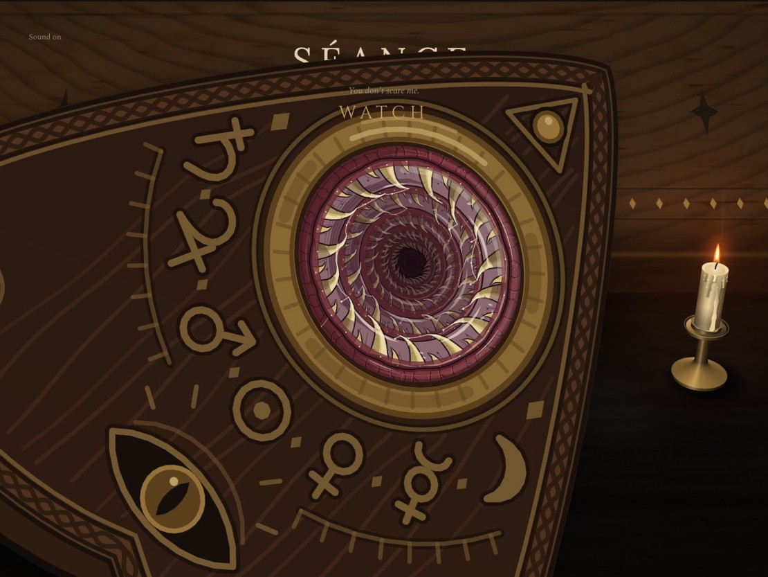 The planchette flung up close to the screen, its lens filled by rings of hooked teeth spiralling into a dark throat